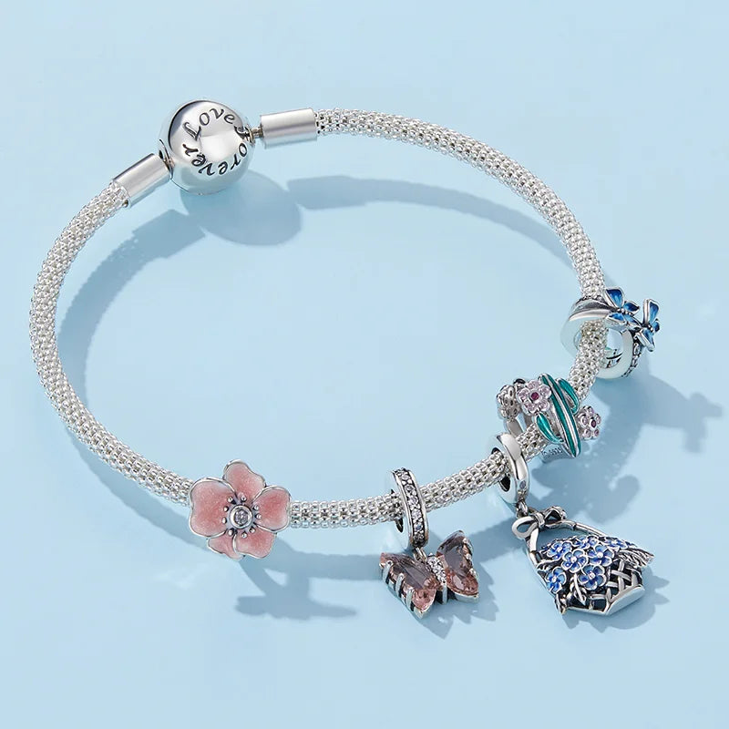 Bijou charm pour bracelet thème fleurs - papillons